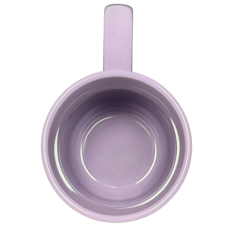 Top view of a purple Edna Mode Disney mug with a solid color and handle