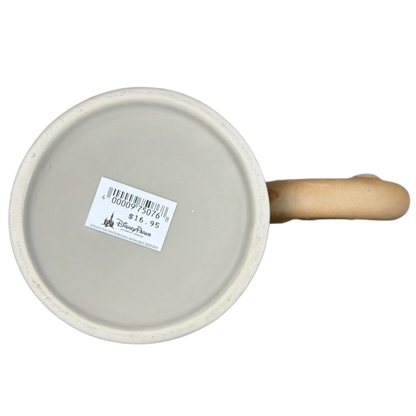 Bottom view of Disney Epcot Germany pretzel mug with price sticker and wooden handle