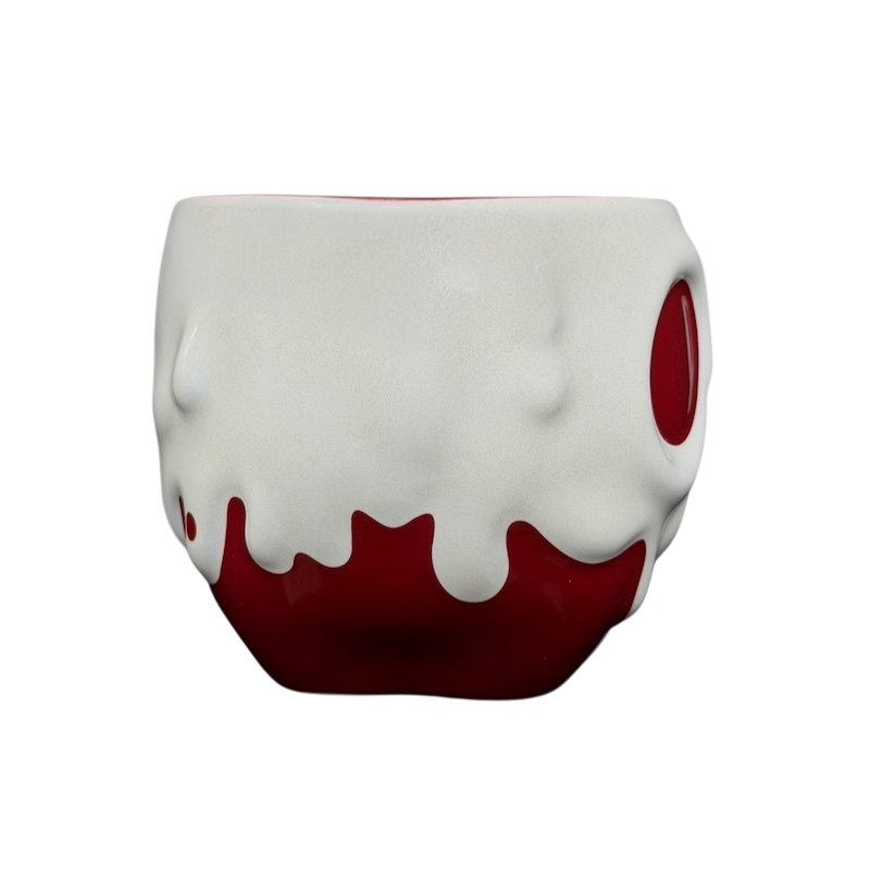 Disney Evil Queen Poison Apple mug with a red base and white dripping design for fans of Disney villains