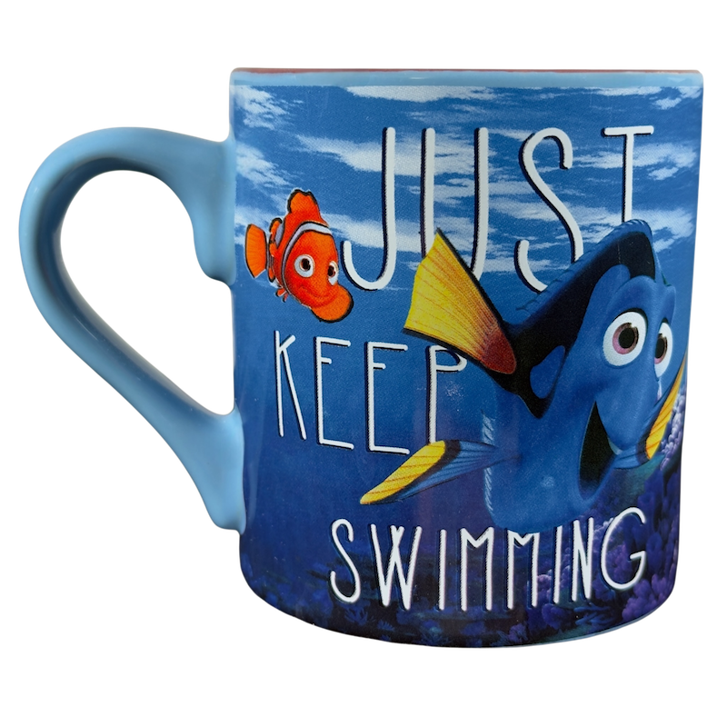 Finding Dory collectible Disney mug featuring Dory and Nemo with 'Just Keep Swimming' quote