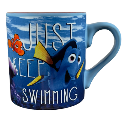 Finding Dory collectible Disney mug featuring Dory and Nemo with a motivational quote