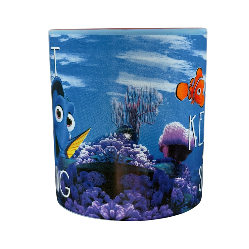 Finding Dory collectible Disney mug featuring Dory and Nemo in a vibrant ocean background