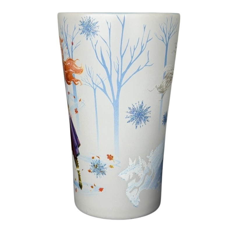 Disney Frozen Elsa and Anna mug featuring vibrant colors and winter-themed designs of the sisters