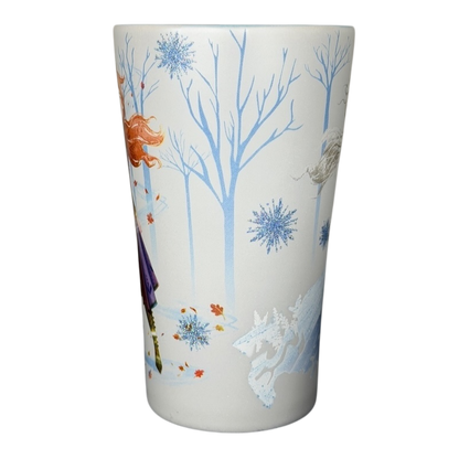Disney Frozen Elsa and Anna mug featuring vibrant colors and winter-themed designs of the sisters