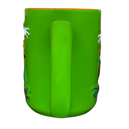 Goofy Celebrating Disneyland Resort Mug in vibrant green color with playful design