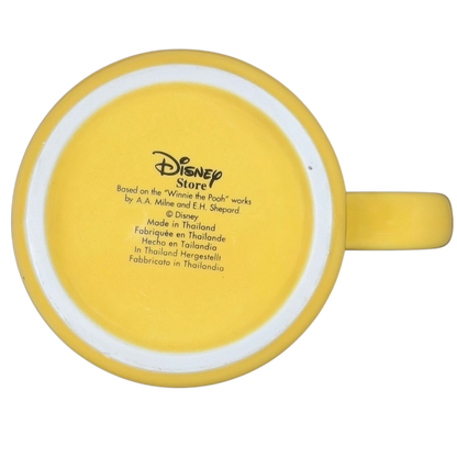 Disney Huggably Pooh embossed mug in bright yellow with a smooth handle, perfect for tea or coffee