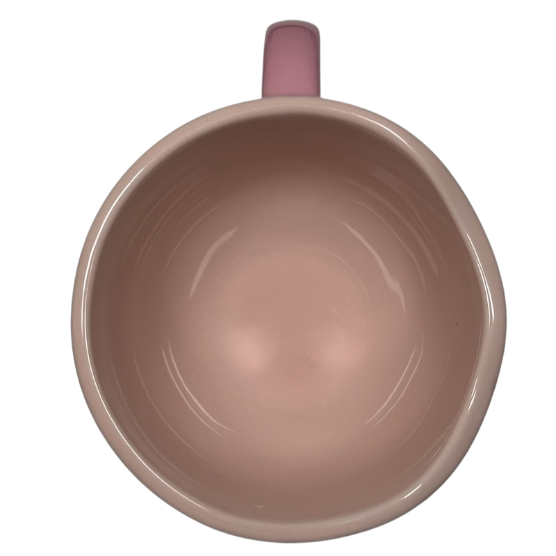 Top view of pink Marie Aristocats Vintage Smile Disney mug showing empty interior and handle