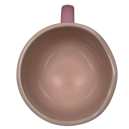 Top view of pink Marie Aristocats Vintage Smile Disney mug showing empty interior and handle