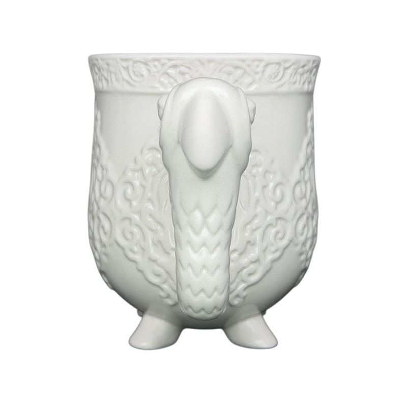 Disney Mary Poppins Parrot Head Umbrella Mug featuring a detailed bird design and textured surface