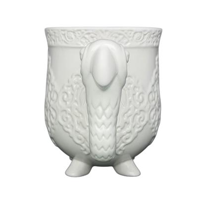 Disney Mary Poppins Parrot Head Umbrella Mug featuring a detailed bird design and textured surface