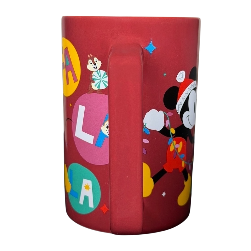 Disney Mickey and Friends holiday mug featuring colorful designs and festive characters
