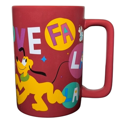 Disney Mickey and Friends holiday mug with colorful design featuring Pluto and festive letters