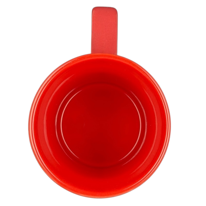 Top view of a bright red Disney Mickey and Friends holiday mug with a smooth finish