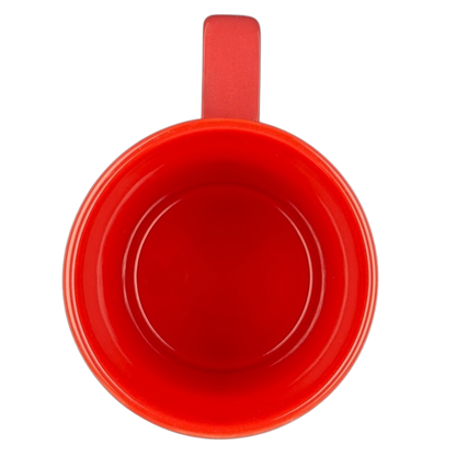 Top view of a bright red Disney Mickey and Friends holiday mug with a smooth finish