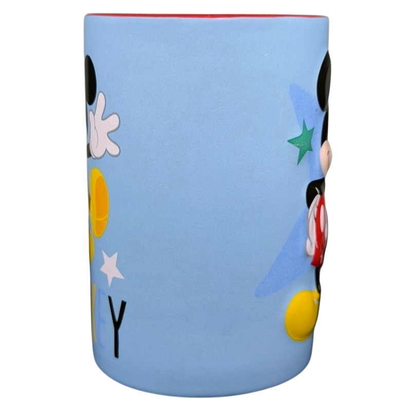 Mickey Mouse embossed stars Disney mug featuring colorful designs and a smooth surface