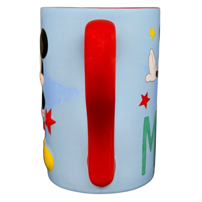 Mickey Mouse embossed stars Disney mug featuring a colorful design with a red handle