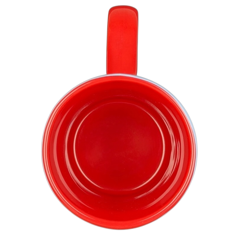 Inside view of a red Mickey Mouse embossed stars Disney mug with a glossy finish