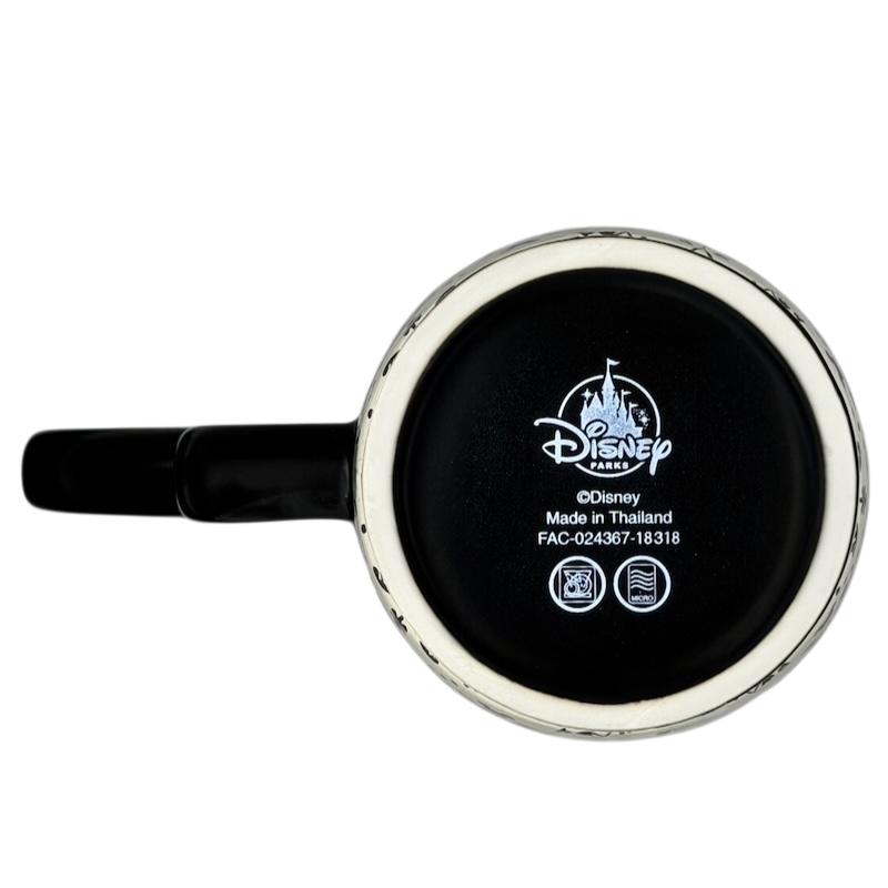Bottom view of Mickey Mouse Icons Scrollwork Latte Mug Disney Parks showing the Disney logo and manufacturer details