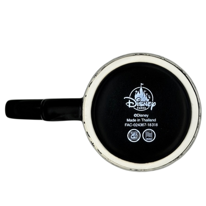 Bottom view of Mickey Mouse Icons Scrollwork Latte Mug Disney Parks showing the Disney logo and manufacturer details