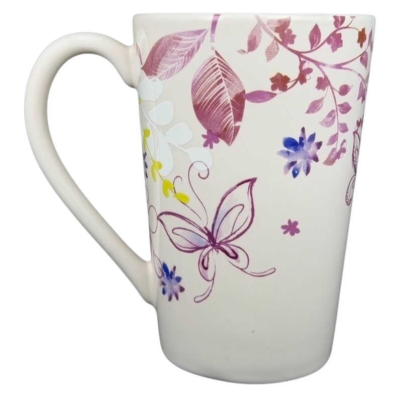 Disney Minnie Mouse butterflies and flowers mug featuring colorful floral designs and a butterfly motif