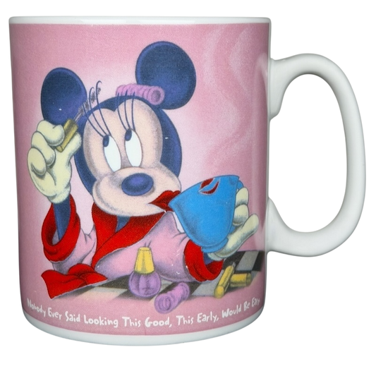 Disney Minnie Mouse jumbo mug featuring Minnie in a robe with beauty products and a playful expression