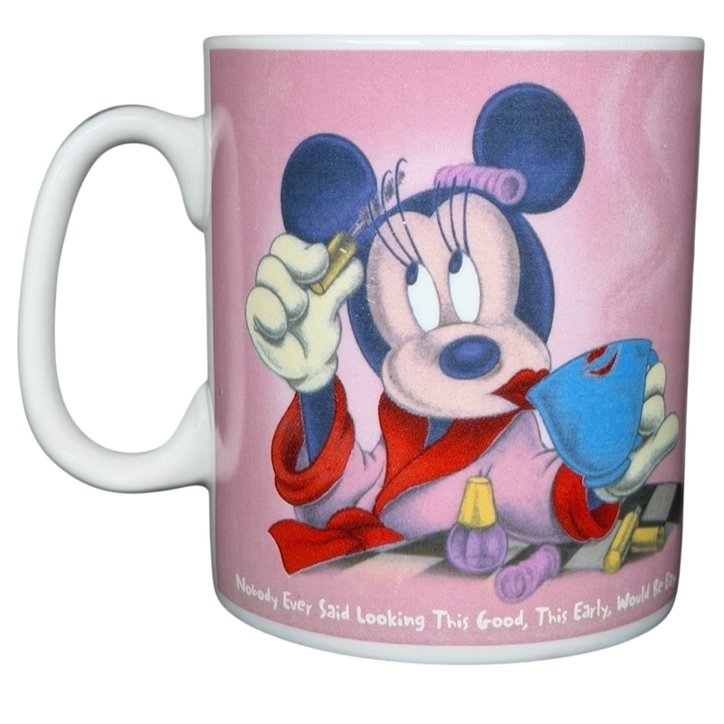 Disney Minnie Mouse jumbo mug featuring Minnie in a pink robe and beauty accessories