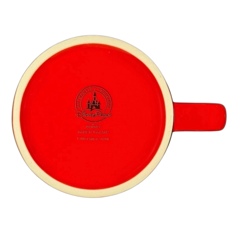 Bottom view of a Disney collectible mug featuring a Minnie Mouse polka dot bow design in bright red