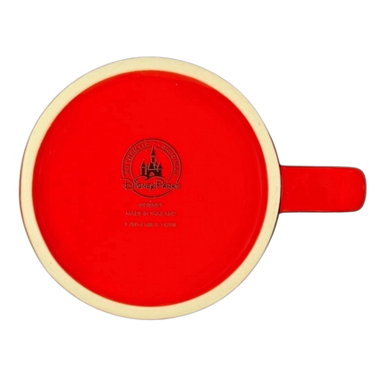 Bottom view of a Disney collectible mug featuring a Minnie Mouse polka dot bow design in bright red