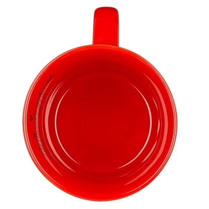 Top view of a red mug showcasing Disney's Minnie Mouse polka dot bow collectible mug design