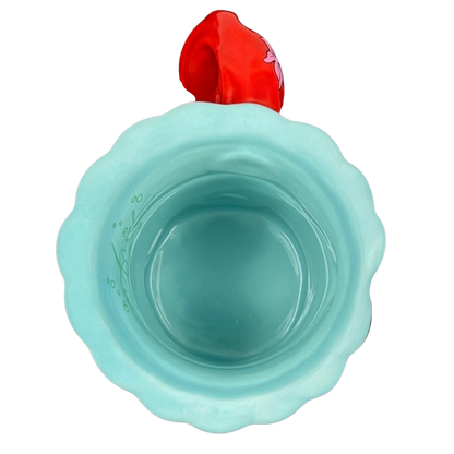 Top view of ceramic turquoise scalloped mug with red Ariel handle Ariel The Little Mermaid Disney Parks vintage mug