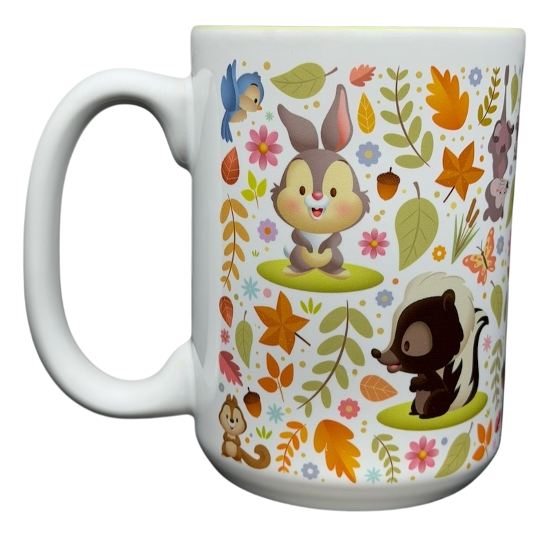 Bambi Woodland Friends Mug Disney Parks featuring adorable animal characters and colorful floral designs