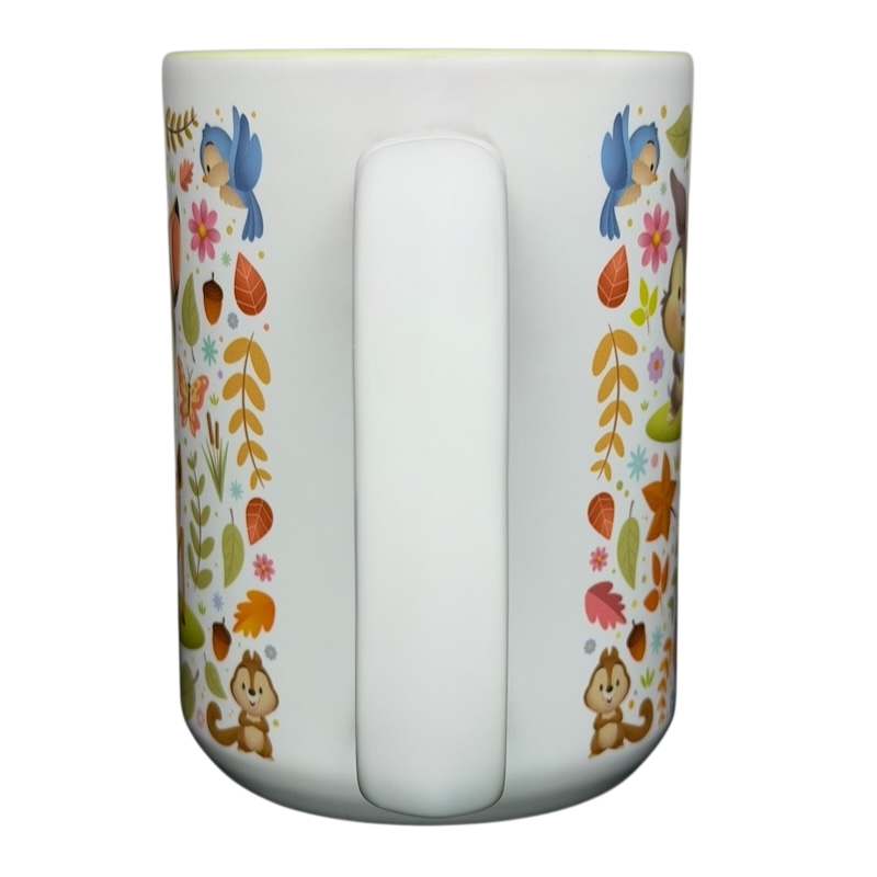 Bambi Woodland Friends Mug Disney Parks featuring colorful animal and floral designs for cozy beverages