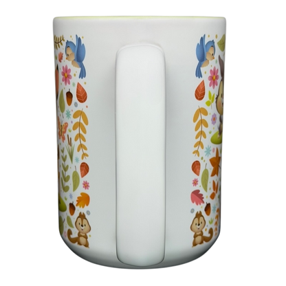 Bambi Woodland Friends Mug Disney Parks featuring colorful animal and floral designs for cozy beverages
