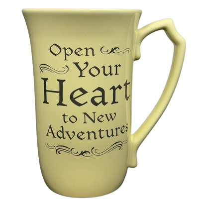 Beauty and the Beast Open Your Heart to New Adventures Mug Disney Parks in a bright yellow color