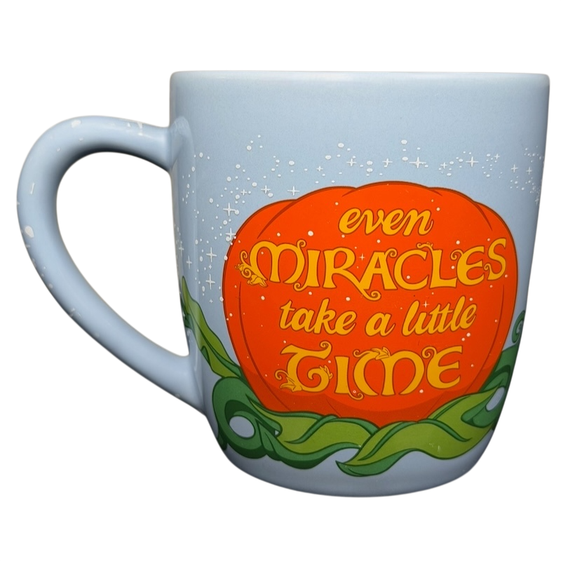 Cinderella Fairy Godmother Mug Disney Parks featuring an orange pumpkin design with inspiring text