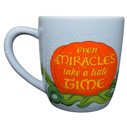 Cinderella Fairy Godmother Mug Disney Parks featuring an orange pumpkin design with inspiring text