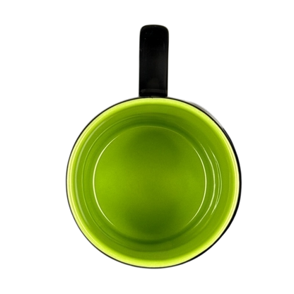 Top view of Disney Villains collectible mug with glossy lime green interior and black handle