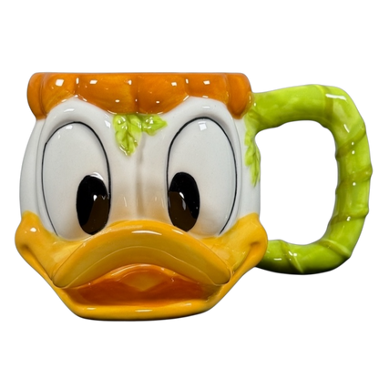 Disney Donald Duck vintage Halloween mug ceramic face shaped like a pumpkin with green vine handle