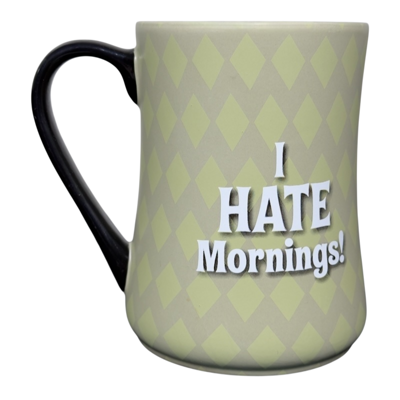 Grumpy Disney vintage collectible mug light green diamond pattern with black handle I HATE Mornings text