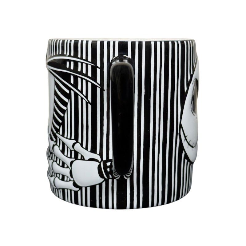 Jack Skellington embossed Disney collectible mug black and white striped ceramic mug showing Jack face and skeletal hand