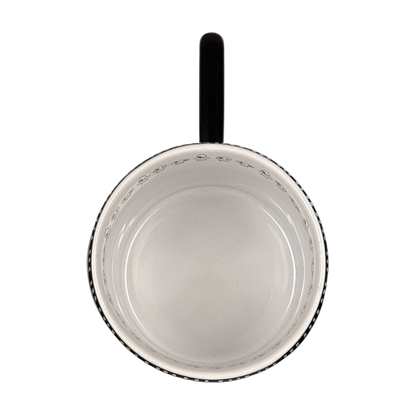 Top view of Jack Skellington embossed Disney collectible mug showing white interior and handle at top