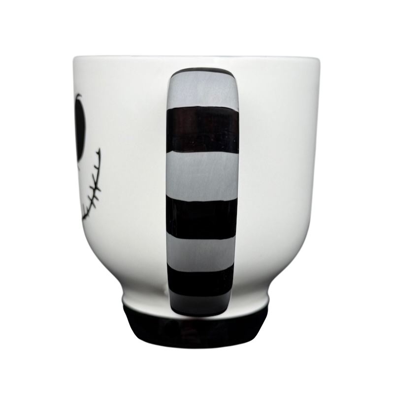Jack Skellington Mug Striped Handle Disney Parks featuring iconic character design and unique striped handle