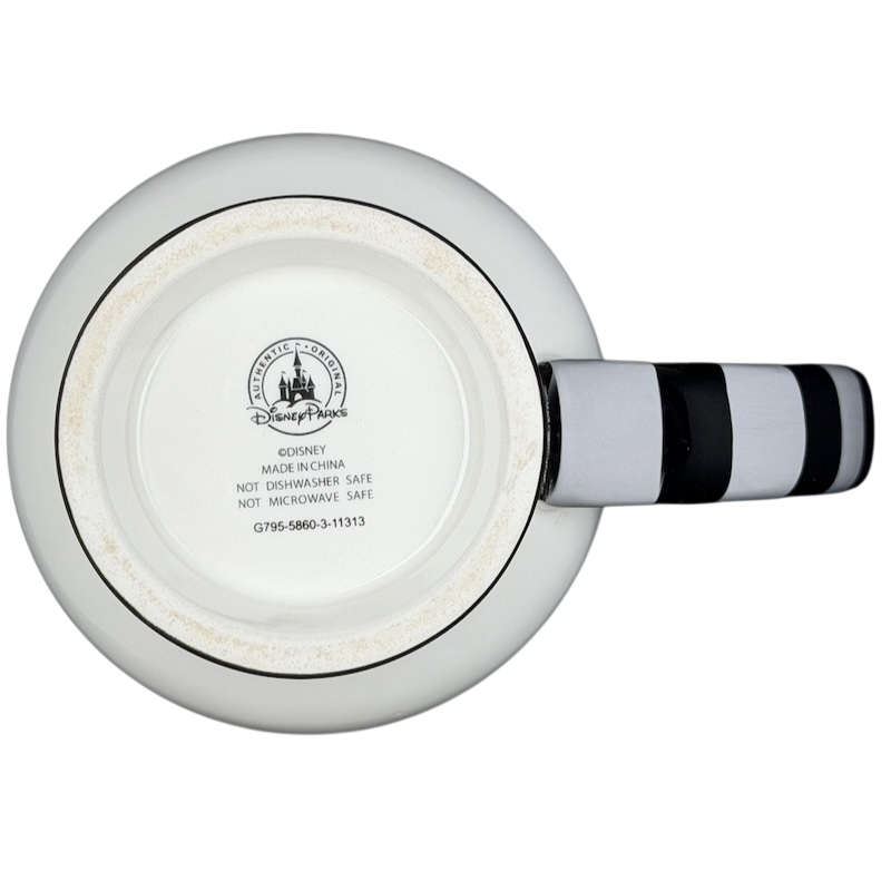 Bottom view of a Jack Skellington Mug Striped Handle Disney Parks with black and white striped handle