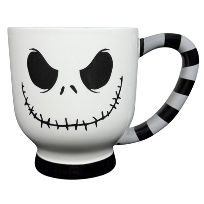 Jack Skellington Mug Striped Handle Disney Parks featuring a spooky smile and striped handle