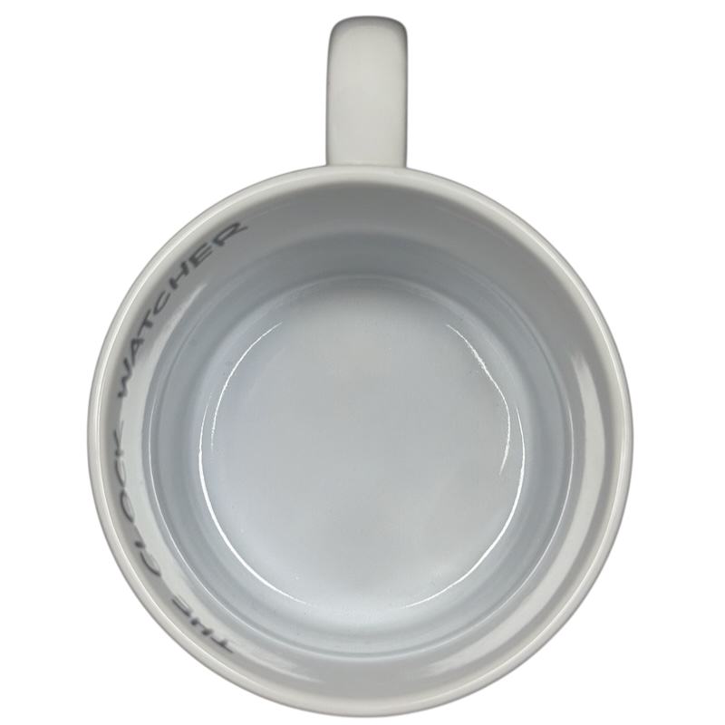 Top view of Disney Parks locally grown vintage mug with white ceramic and handle on black background