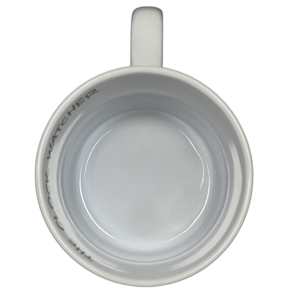 Top view of Disney Parks locally grown vintage mug with white ceramic and handle on black background