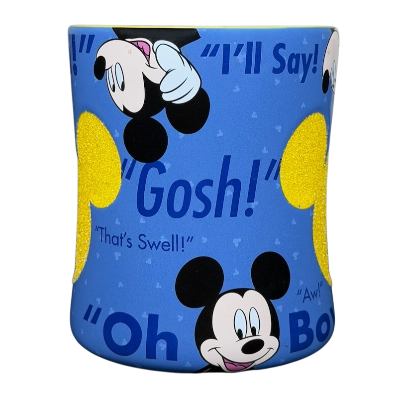 Mickey Mouse collectible Glitter Mug Disney Parks featuring colorful designs and iconic phrases
