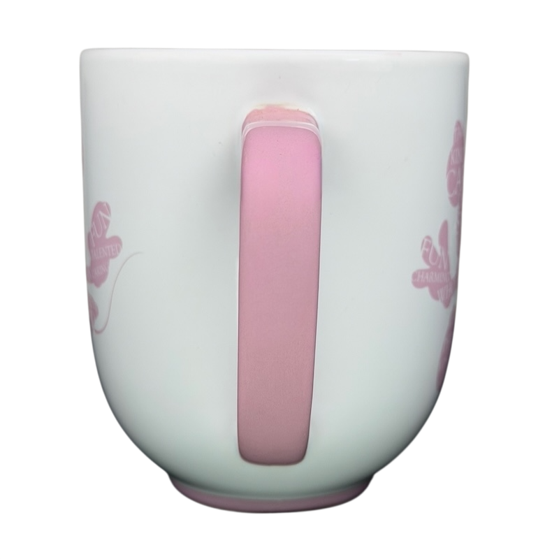 Minnie Mouse Silhouette Mug Disney Parks featuring a pink handle and whimsical design