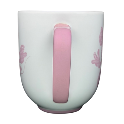 Minnie Mouse Silhouette Mug Disney Parks featuring a pink handle and whimsical design