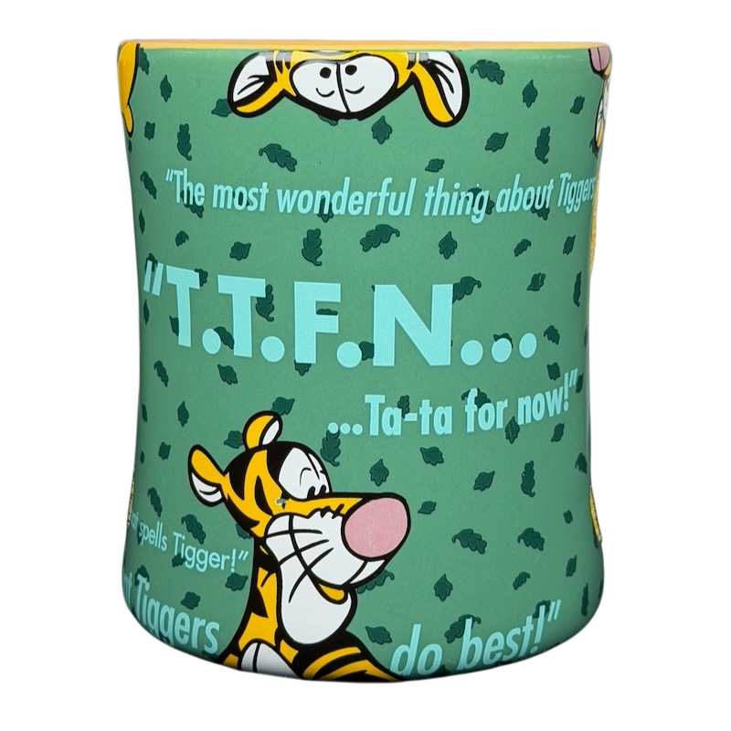 Tigger T.T.F.N. Glitter Collectible Mug Disney Parks featuring fun quotes and colorful design